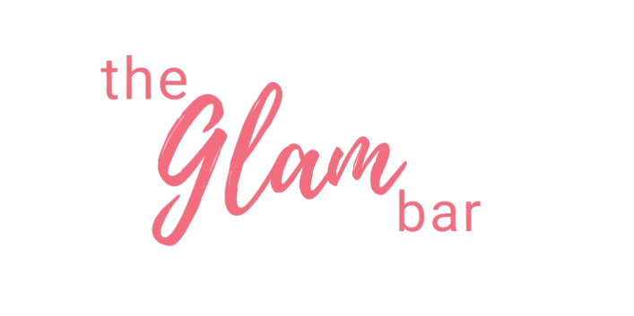 The Glam Bar - Child receiving colourful hair extensions and makeover during a trendy kids spa party with face glitter and games